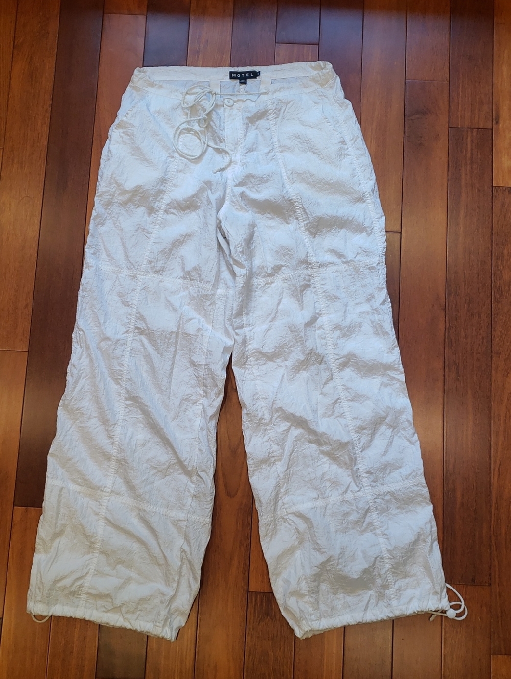 Women's light weight sheer white wide leg pants. Size Medium